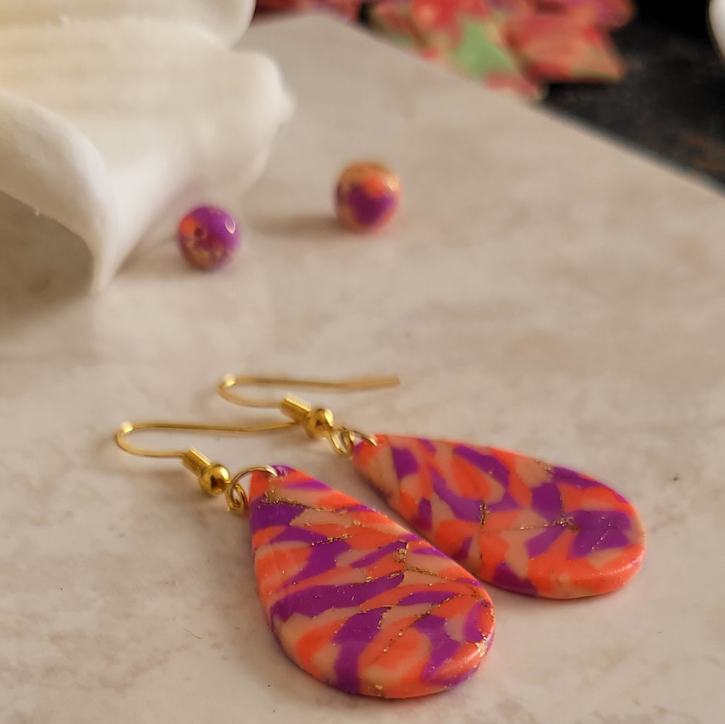 "Boucles d'oreilles gouttes faites main pâte polymère – Alysel Créations"
Pays d'origine si tu vends en Europe (utile pour les douanes)
