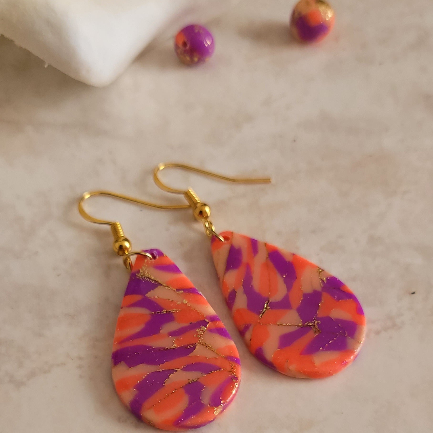 "Boucles d'oreilles gouttes faites main pâte polymère – Alysel Créations"
Pays d'origine si tu vends en Europe (utile pour les douanes)