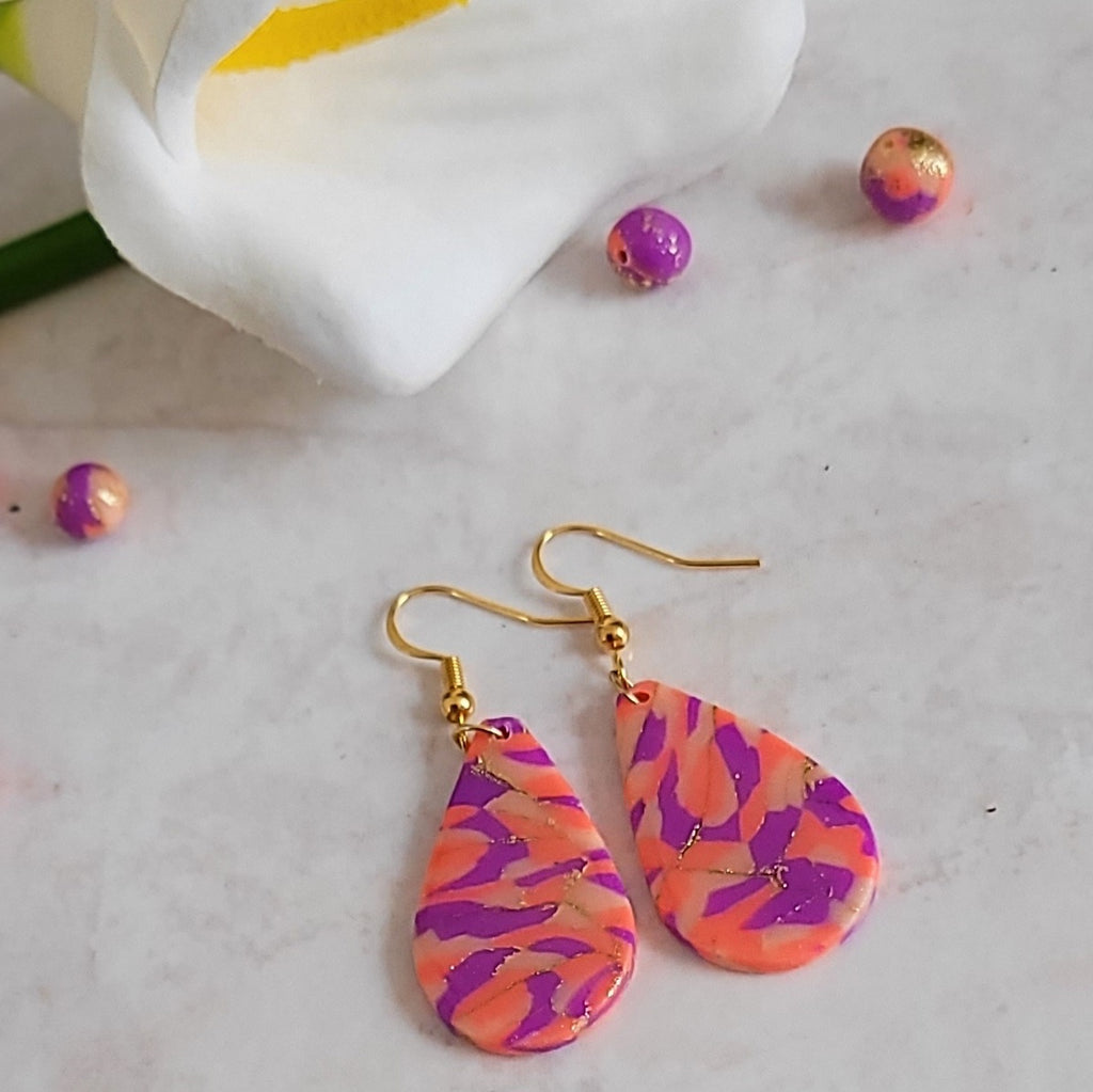 "Boucles d'oreilles gouttes faites main pâte polymère – Alysel Créations"
Pays d'origine si tu vends en Europe (utile pour les douanes)